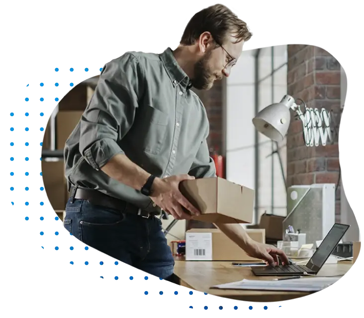 Small business owner packaging and shipping customer orders